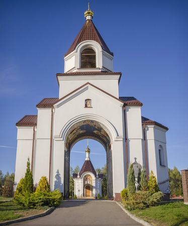 Belarus, Minsk, Tarasovo: orthodox Nativity Church - the main gate and a chapel.の写真素材