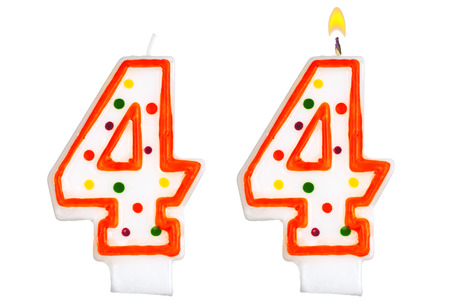 Birthday candles number four isolated on white backgroundの写真素材