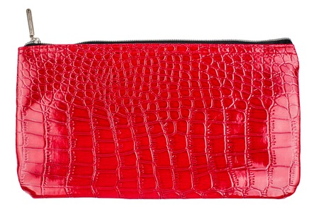 red cosmetic bag isolated on white backgroundの写真素材