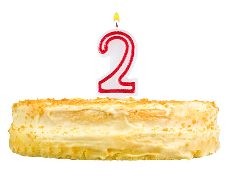 birthday cake with candles number two isolated on white backgroundの写真素材