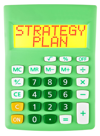 Calculator with STRATEGY PLAN  isolated on display on white backgroundの写真素材