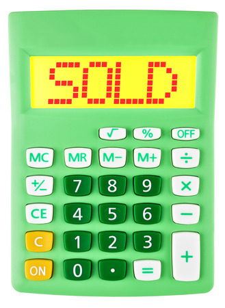 Calculator with SOLD on display isolated on white backgroundの写真素材
