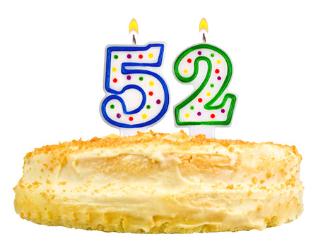 birthday cake with candles number fifty two isolated on white backgroundの写真素材