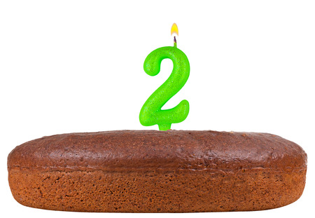 birthday cake with candles number 2 isolated on white backgroundの写真素材
