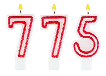 candles number seven hundred seventy-five isolated on white backgroundの写真素材