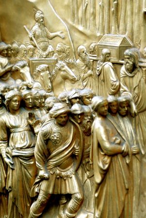 close-up of the door of paradice,in the scquere of the duomo of florence.The door, in the midle of the square(a copy,because the original is inside) has 12 images,thas a close-up of one of then.の写真素材