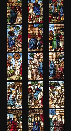 Ancient stained glass in the cathedral of Milan, Italyの写真素材