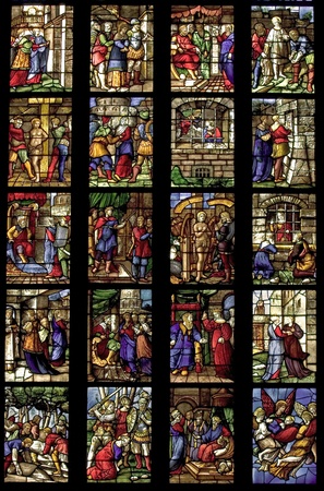 Ancient stained glass in the cathedral of Milan, Italyの写真素材