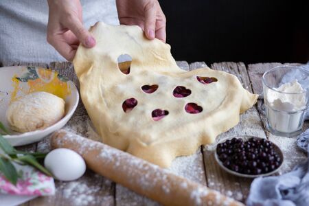 Cooking cherry pie. Work with the testの写真素材