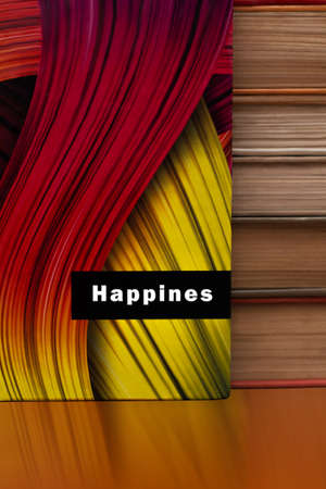 Abstract rainbow color strip wave paper vertical background. Abstract cover notebook. A stack of lying books.の写真素材