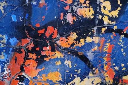 Colorful wall background with damaged paints of blue.の写真素材