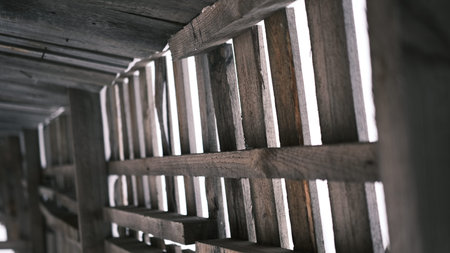 Old outdoor gray wooden wall background photo texture.