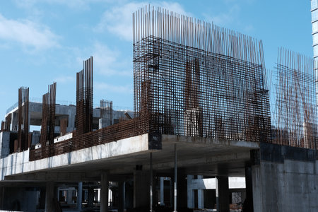 Rebars bars for concrete wall construction of a new building. Construction site. Iron structure ready to be cast with concrete. Steel bars construction for concreting. Brand new armatureの写真素材