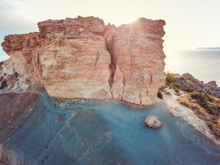 Spectacuular shot of the rock against the sun