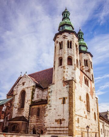 Old cathedral with a dramatic sky on the backgroundの写真素材