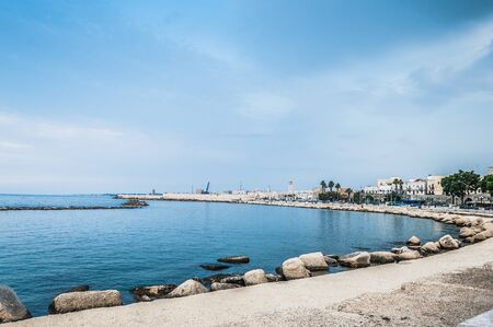 View on the calm sea in the evening on hte border with Italyの写真素材