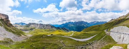Austrian Alps under white cloudsの写真素材