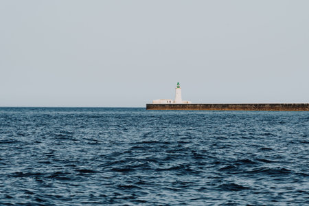 Small lighthouse on the peerの写真素材