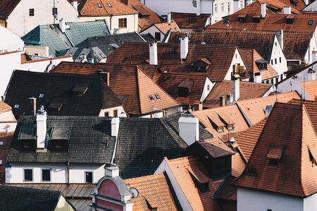 Red rooftops shot from drone, old houses in the summer afternoon lightの写真素材
