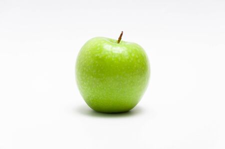 Fresh green apple on the whiteの写真素材