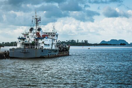 Old military boat in the harbourの写真素材