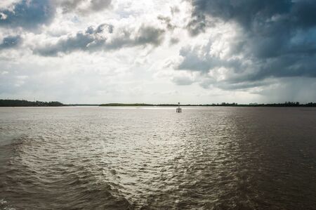 Dark ocean water under storm skyの写真素材