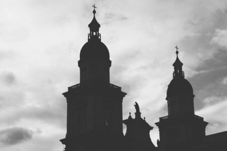 Black and white silhouette of a cathedral in front of a light grey skyの写真素材