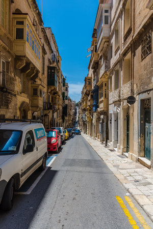 Valletta, Malta - June 20, 2019 - beautiful street in the historical part of the city in summer, under the blue skyのeditorial素材