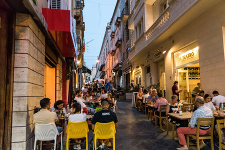 Valletta, Malta - June 20, 2019 - early evening in the central district of the city with the restaurantsのeditorial素材