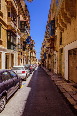 Valletta, Malta - June 20, 2019 - beautiful street in the historical part of the city in summer, under the blue skyのeditorial素材