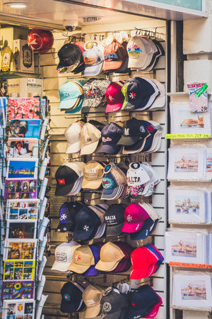 Valletta, Malta - June 20, 2019 - Malta baseball caps in the souvenir shop in downtownのeditorial素材