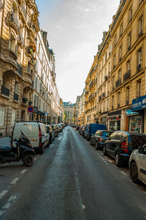 Paris, France - Apr 19, 2019 - Heavily parked narrow street in the historical part of the cityのeditorial素材
