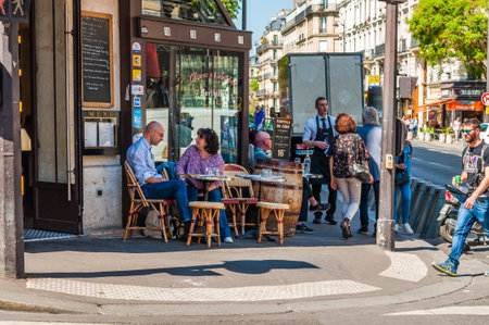 Paris, France - Apr 20, 2019 - People spending morning in the restaurant in the central part of the cityのeditorial素材