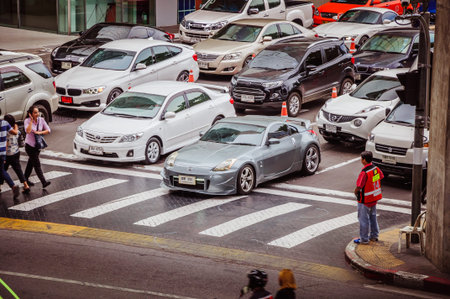 Bangkok, Thailand - July 18, 2015: Very busy street in Bangkok business district