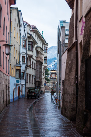 Innsbruck, Austria - Dec 30, 2018 - Old buildings after the rain on the narrow streetのeditorial素材