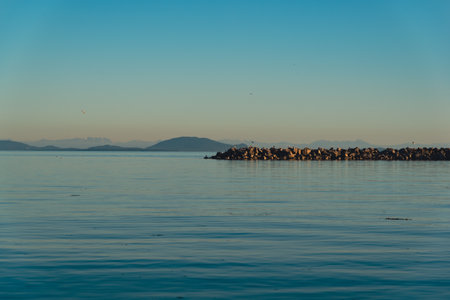 Calm ocean during sunset in Vancouver bay areaの写真素材
