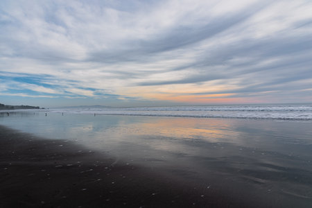 Cloudy sunset on the beach in Californiaの写真素材