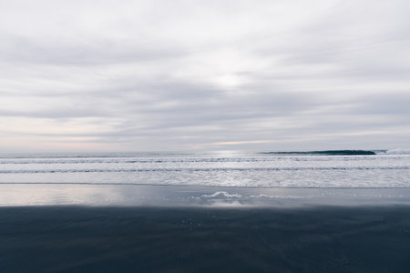 Cloudy sky on the ocean beach afternoonの写真素材