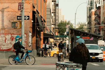 New York, US - May 7, 2023 - Busy downtown street on late afternoon