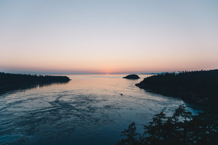 Sunset view from the mountain on Pacific Ocean shoreの写真素材