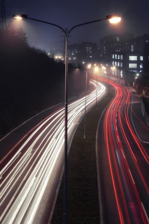 Traffic light trail at night. Aerial view of light city traffic trail at night, in Belgrade, Serbia,...