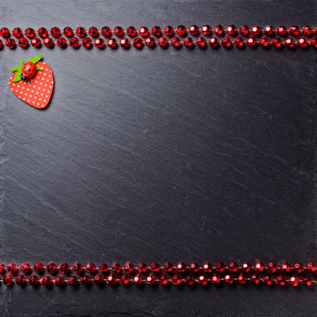 Decorative background, black board framed with decorations, space for a text, top view.の写真素材