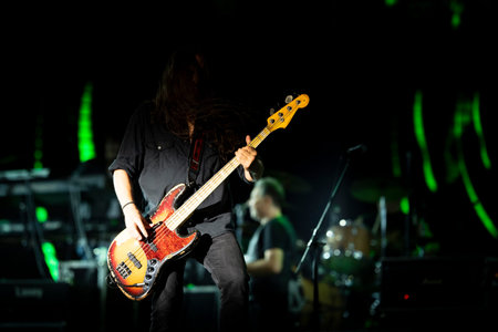 Guitarist on a stage playing rock song