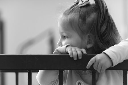Close up portret of little beautiful caucasian girl - Black and whiteの写真素材