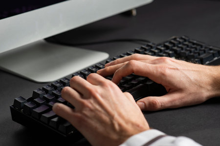 Business, education, programming, people and technology concept - typing male hands on keyboard