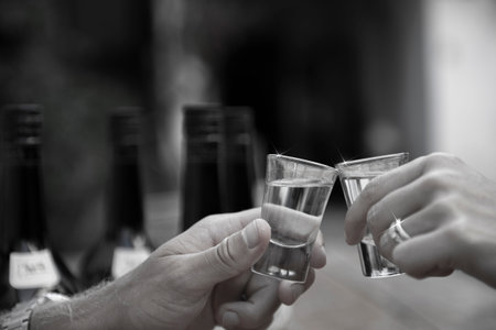 Bless you! Knocking glasses with brandy