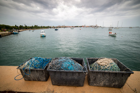 The harbor of the fishing boats of the coastal town of Umag on the Istrian peninsula, Croatiaの写真素材