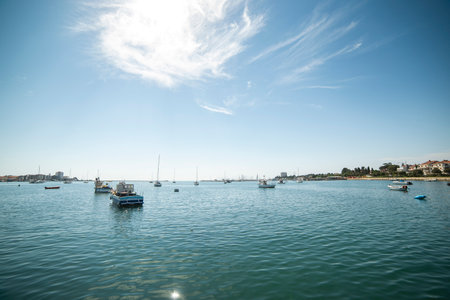 The harbor of the fishing boats of the coastal town of Umag on the Istrian peninsula, Croatiaの写真素材