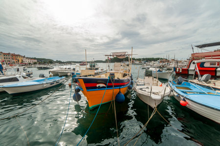 The harbor of the fishing boats of the coastal town of Rovinj on the Istrian peninsula, Croatiaの写真素材