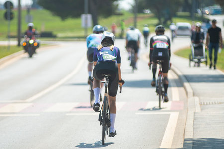 A cyclist rides a bicycle on a bicycle path. Sports and recreation.の写真素材